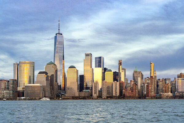 New York city Manhattan skyline cityscape at sunset from New Jersey.