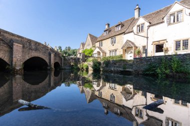 Castle Combe village in Cotswolds England UK clipart