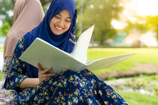 Teenager Young Adult Asian Thai Muslim University Student Reading Book — стоковое фото