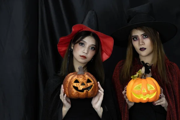 Two teenages and young adult girl women in Halloween costume for Halloween party background — Stock Image Two Teenages Young Adult Girl Women Halloween Costume Halloween Party Royalty Free Stock Images