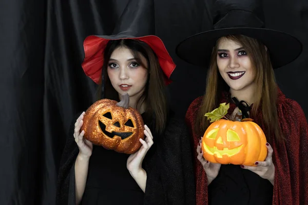 Two teenages and young adult girl women in Halloween costume for Halloween party background — Stock Image Two Teenages Young Adult Girl Women Halloween Costume Halloween Party Stock Photo