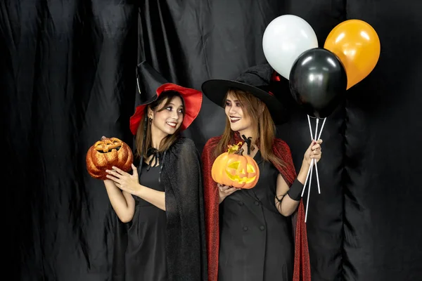 Two teenages and young adult girl women in Halloween costume for Halloween party background — Stock Image Two Teenages Young Adult Girl Women Halloween Costume Halloween Party Stock Picture