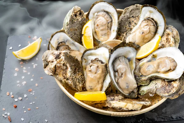 Fresh Oyster Serve Lemon Basket Black Stone Plate Fresh Seafood — Stock Photo, Image