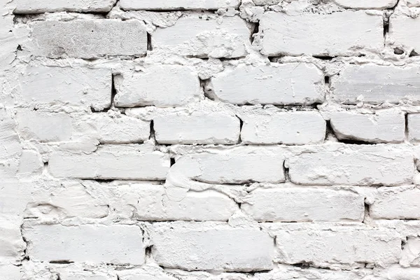 Beyaz rustik doku. Retro eski tuğla duvar yüzeyi badanalı. Vintage yapısı.