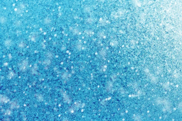 Inverno sfondo blu di fiocchi di neve e gelo Immagine Stock