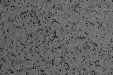 Suni mermer ile yapay vinil doku. Arka plan gri, beyaz ve kahverengi ekmek kırıntısı ile. Kopya alanı