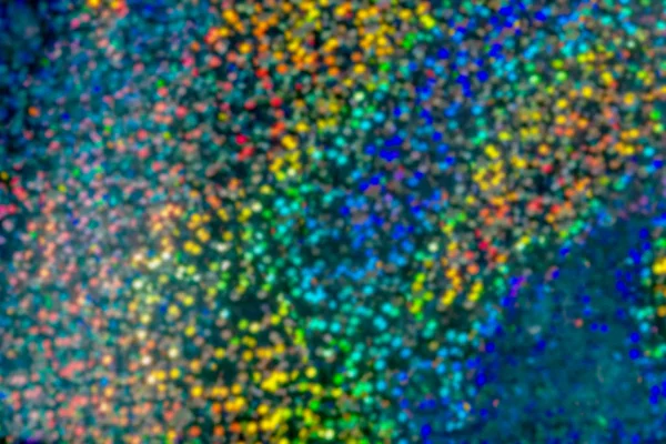 Αφηρημένο φόντο. Πολύχρωμο bokeh από μικρά φώτα σε θολούρα. Κουκκίδα φανάρια πράσινου, κόκκινου, μπλε χρώματος — Φωτογραφία Αρχείου