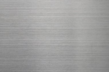 Boş fırçalanmış metal yüzey. Tasarım ve arka plan için soyut arka plan