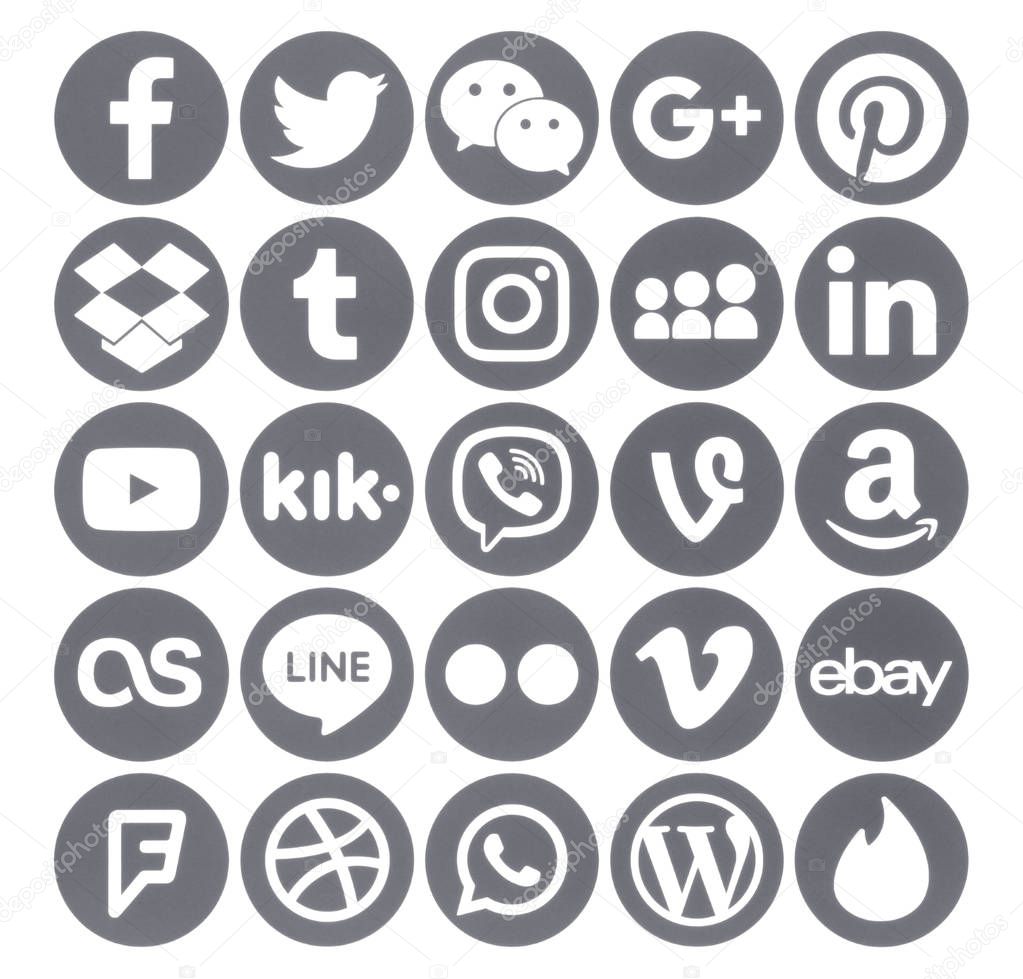 Kiev, Ukraine - June 19, 2018: Collection of popular gray round social media icons, printed on paper: Facebook, Twitter, Google Plus, Instagram, Pinterest, LinkedIn, Tumblr and others