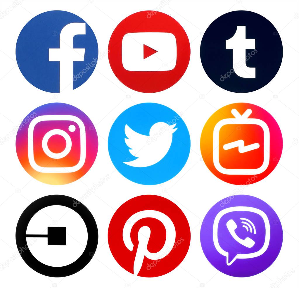 Kiev, Ukraine - August 16, 2018: Collection of popular circle social media new icons printed on paper: Facebook, Youtube, Viber, Instagram, IGTV, Twitter, Pinterest, Tumblr and Uber