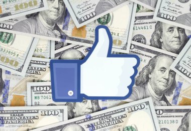 Kiev, Ukrayna - 18 Eylül 2018: kağıda basılmış, kesme ve para arka plan üzerine yerleştirilen Facebook gibi logo. Facebook bir Amerikan online sosyal medya ve sosyal ağ hizmet şirketi olduğunu