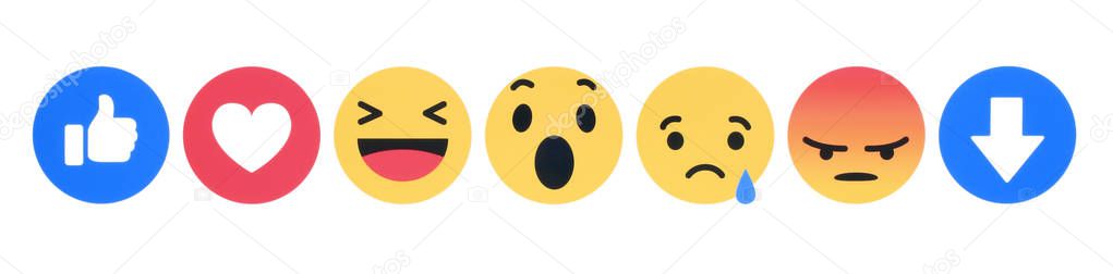 Kiev, Ukraine - November 28, 2018: New Facebook like button 7 Empathetic Emoji Reactions printed on white paper. Facebook tests new Downvote button