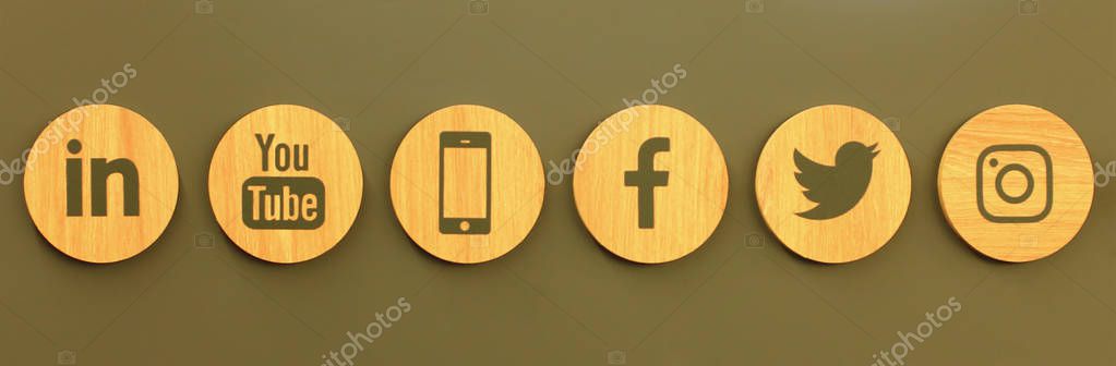 Kiev, Ukraine - August 02, 2018: Set of popular social media wooden icons on the wall of the shop: Facebook, Twitter, Instagram, Linkedin, YouTube and Smartphone
