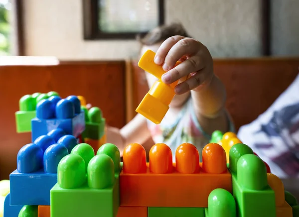 Child Playing Cubes Puts Cube — Stock Photo, Image