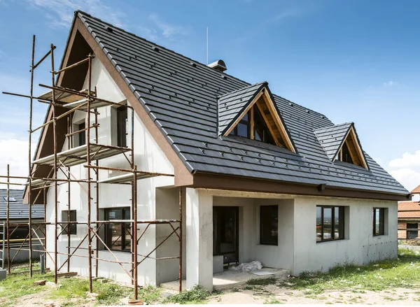 Чи вигідно будувати будинок в Україні depositphotos 218440806 stock photo small new build houses Чи вигідно будувати будинок в Україні