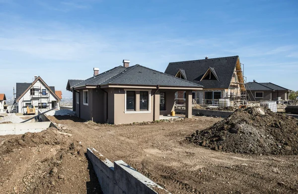 New build houses. Sunny day. Construction site