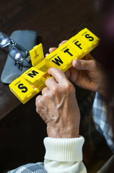 Senior woman take pills from box. Healthcare and old age concept — Stock Photo, Image