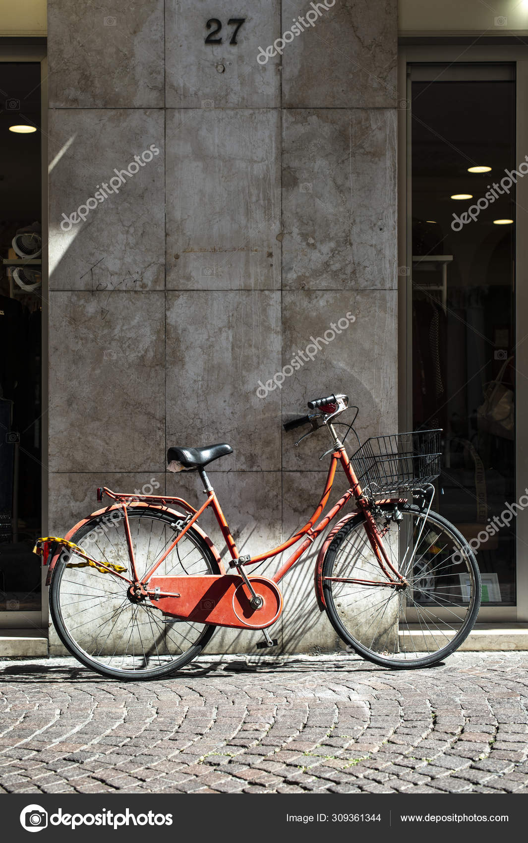 red bike with basket