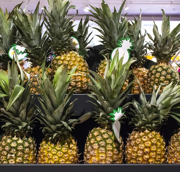 Ananas on shelf in supermarket. — Stock Photo, Image