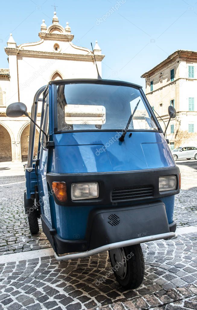 Typical italian farm ape truck on three wheels.