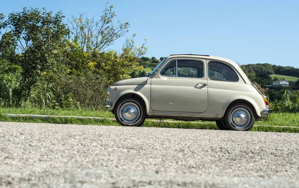Vintage beige color car. Small old car. Italian car. — Stock Photo, Image