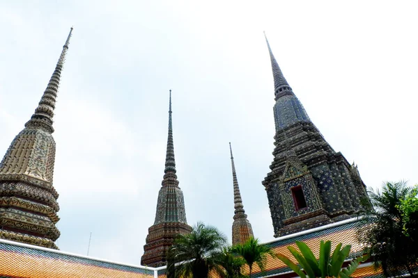 Background of Thailand rich cultural temple with oriental Thai traditional paint wall of Ramayana at Royal Grand Palace of the King Rama era