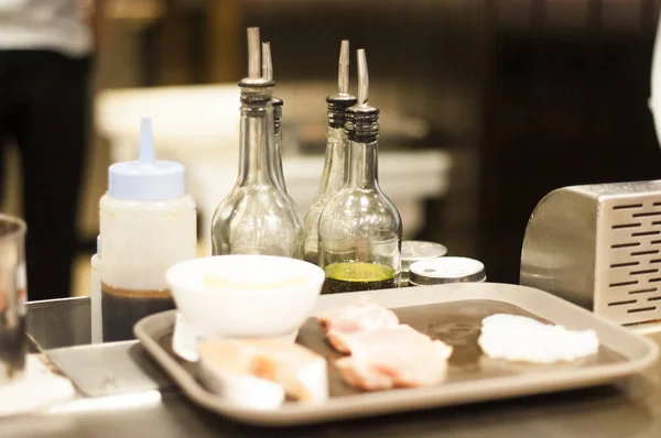 Utensils and ingredients of Teppanyaki cooking live at nice restaurant