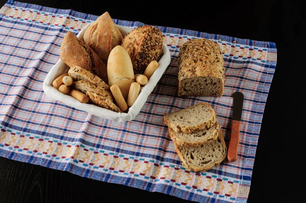 fresh variety bread on black background, food, diet, low carbohydrate high fat, gluten free,weight loss,