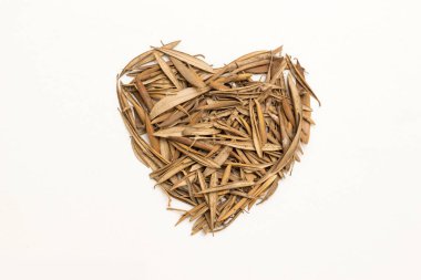 Heart Made of Yellow Brown Dry Leaves, Isolated on White Background clipart