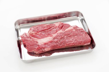 Chuck göz Roll bir paslanmaz çelik tepsisinde