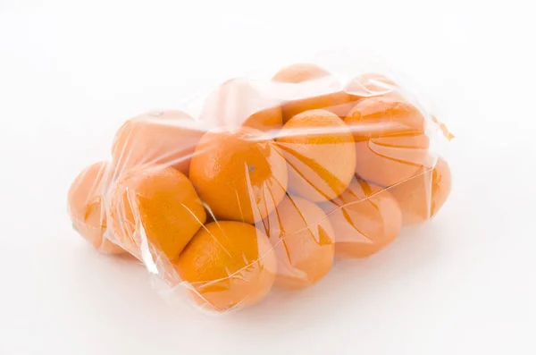 Rijp Citrus Unshiu Satsuma Oranje Plastic Zak Witte Achtergrond — Stockfoto