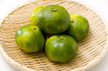 Citrus unshiu, mandarin satsuma orange on Bamboo eleve