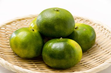 Citrus unshiu, mandarin satsuma orange on Bamboo eleve