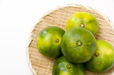 Citrus unshiu, mandarin satsuma orange on Bamboo eleve