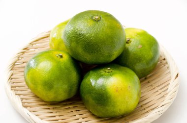 Citrus unshiu, mandarin satsuma orange on Bamboo eleve