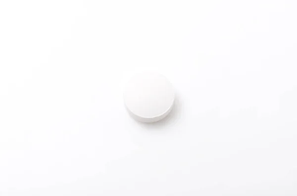 Vita Tabletter Vit Bakgrund — Stockfoto