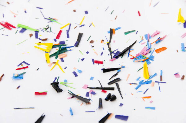 Crayons shavings  on white background