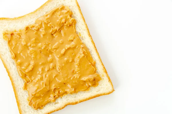 Erdnussbutter Auf Einer Scheibe Weißbrot — Stockfoto