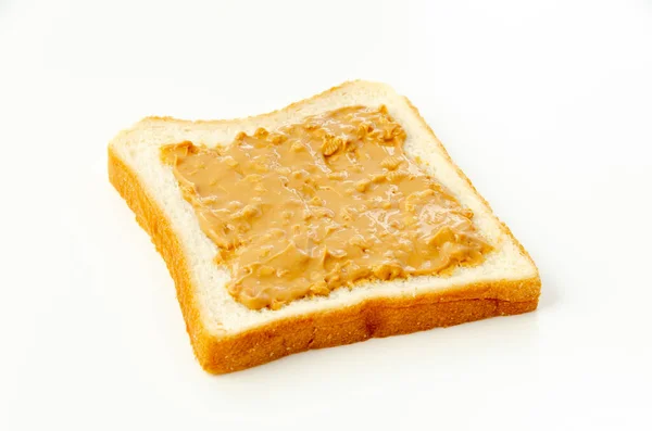 Арахисовое Масло Ломтике Белого Хлеба — стоковое фото