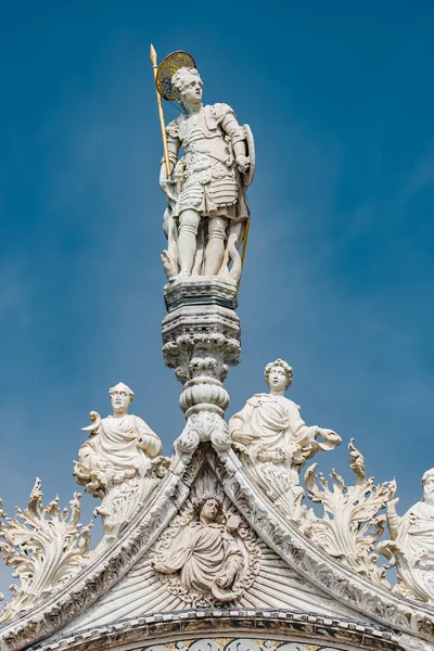 Roman warrior as roof decoration of Basilica San Marco in Venice, Italy
