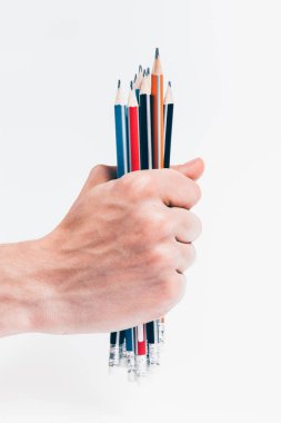 Açık arkaplanda çok renkli grafit kalemler..