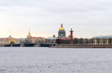 Old Saint Petersburg Stock Exchange and Rostral Columns on the Spit of Vasilievsky Island. clipart