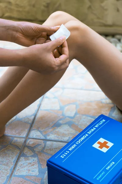 Woman Puts Adhesive Bandage Child Knee — Stock Photo, Image