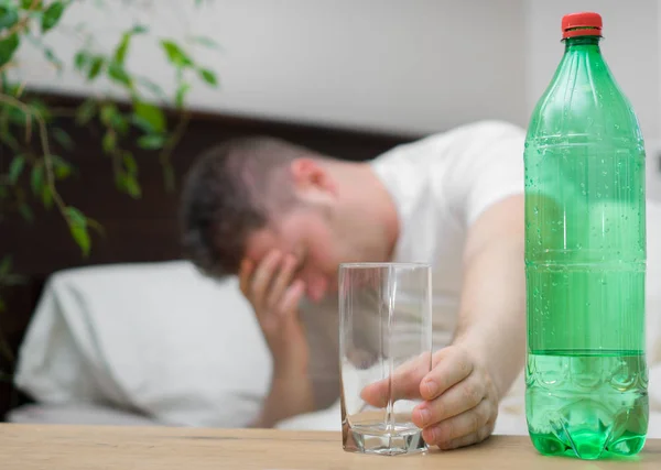 Man Drinking Mineral Water Suffering Hangover — Stock Photo, Image