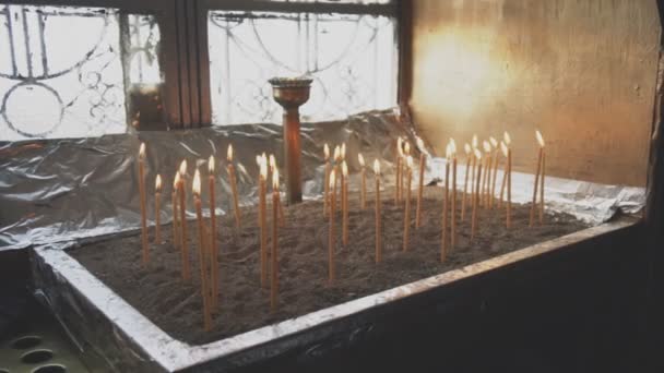 Many Candles Glowing Table Church — Stock Video