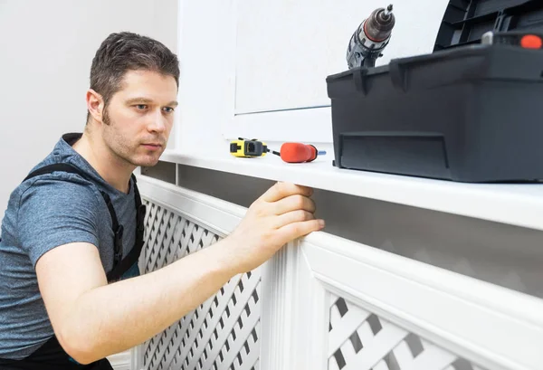 Professional Handyman Assembling Radiator Cabinet Home — Stock Photo, Image