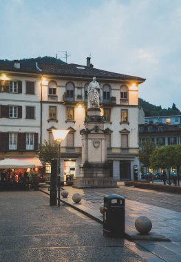 Alessandro Volta Statue in Como town at evening.