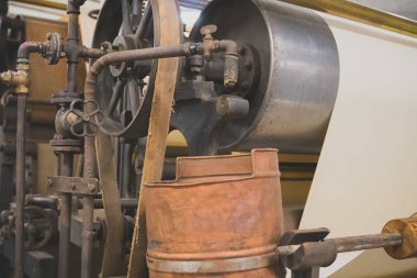 Poyraz. Tekstil terbiye için kullanılan, onun gibi endüstriyel demir.