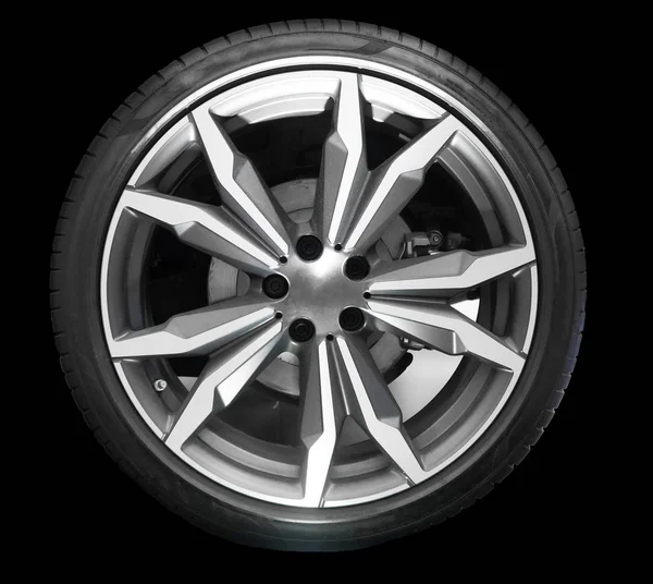 Sports car wheel isolated on black background. — Stock Photo, Image