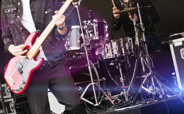 Rock concert. Guitarist and drummer in action. — Stock Photo, Image